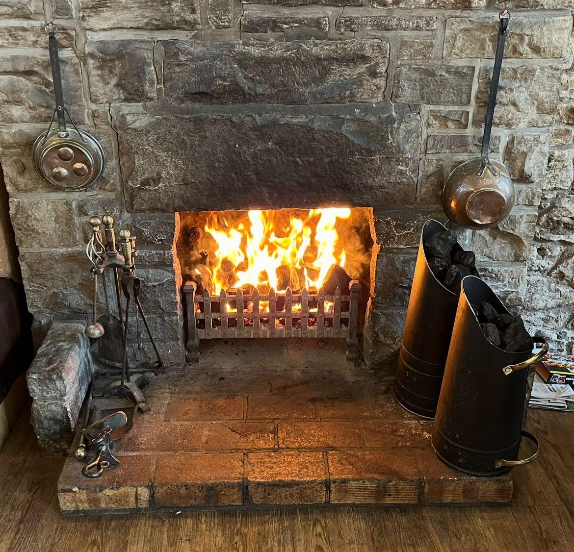 Open fireplace at The Gordon Arms.